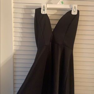 Black sleeve less deep V black dress
